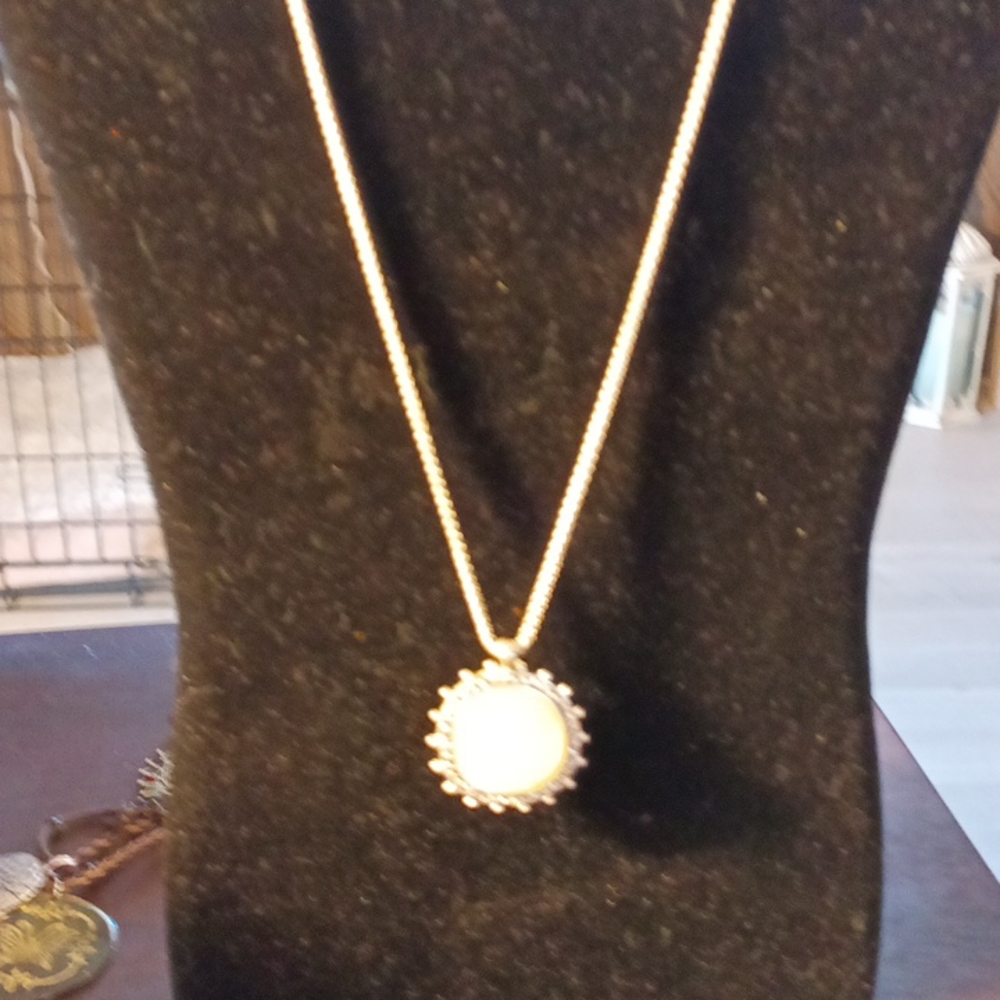 Sterling silver necklace with white glass medallion